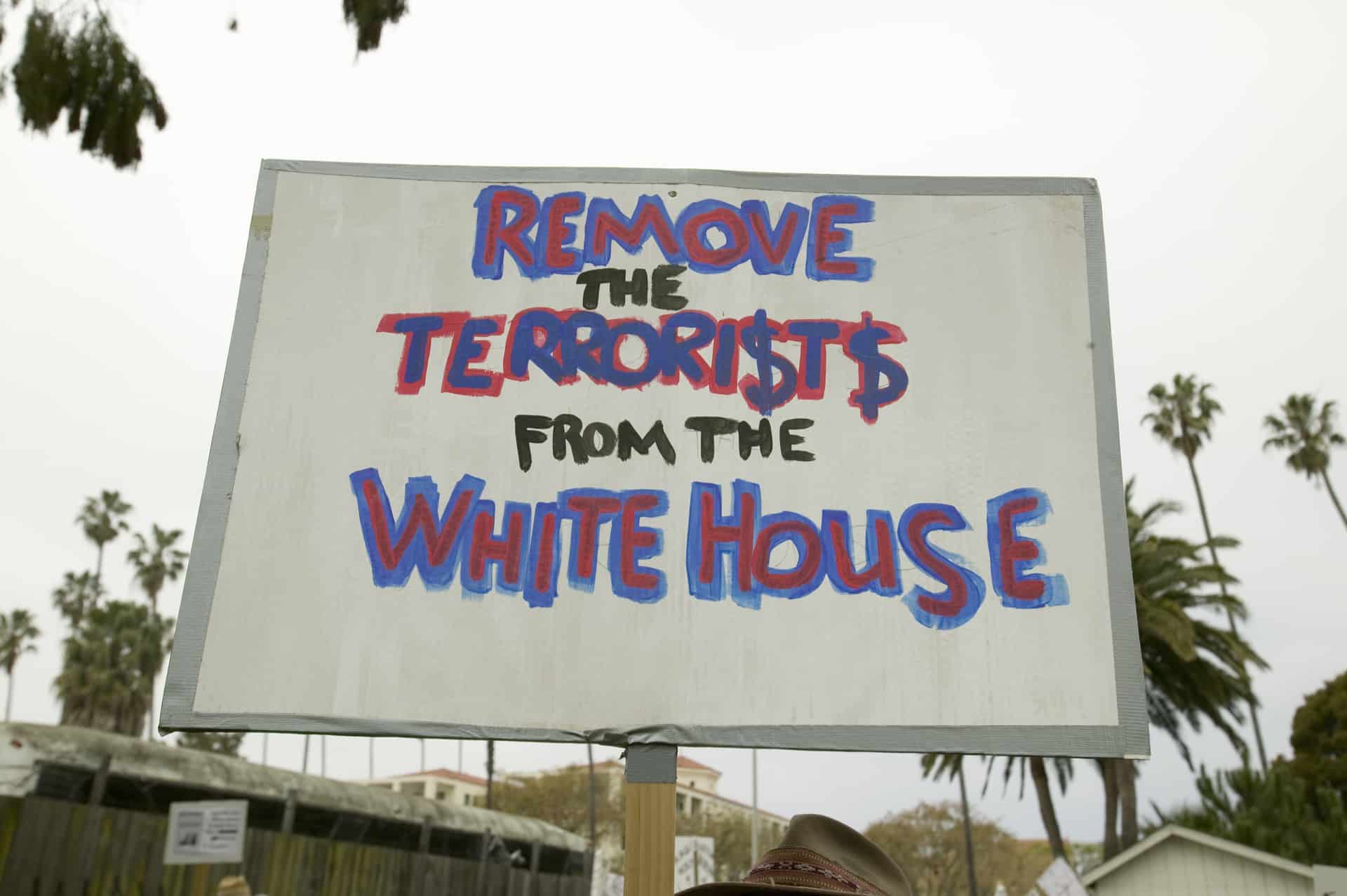 Sign that says "Remove the TERRORI$T$ from the White House"