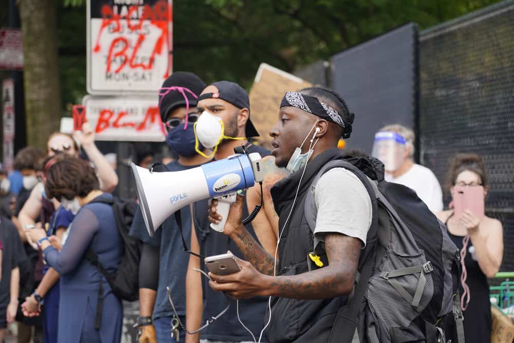 Black Protester with a Megaphone