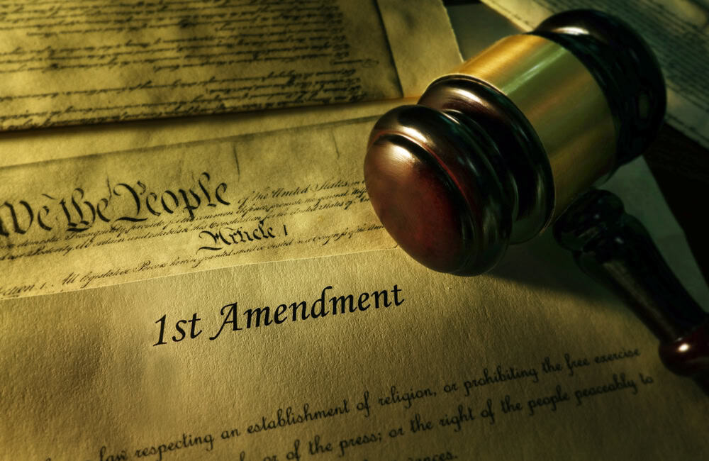 The Constitution with the words "1st Amendment"
