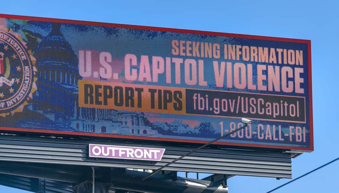 Billboard saying "Seeking Information on US Capitol Violence"