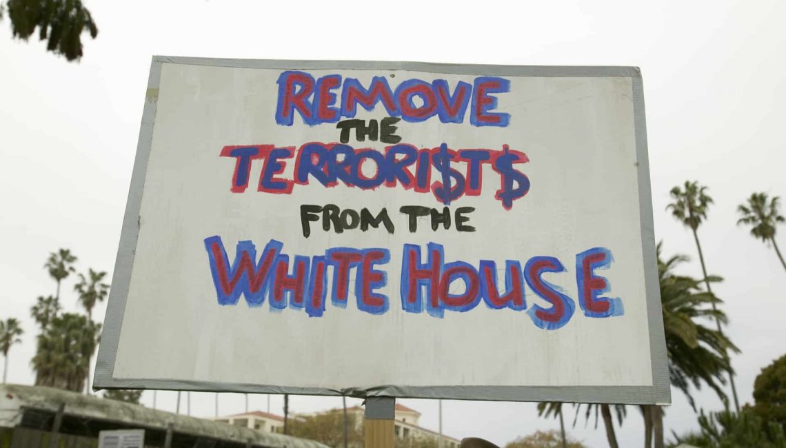 Sign that says "Remove the TERRORI$T$ from the White House"