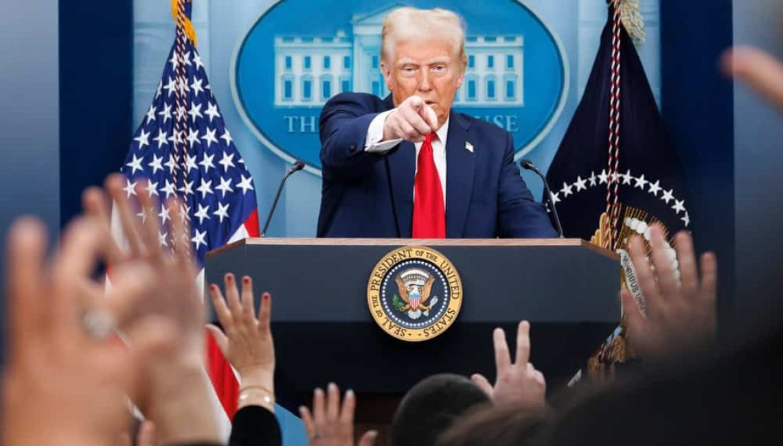 Trump pointing at the Press